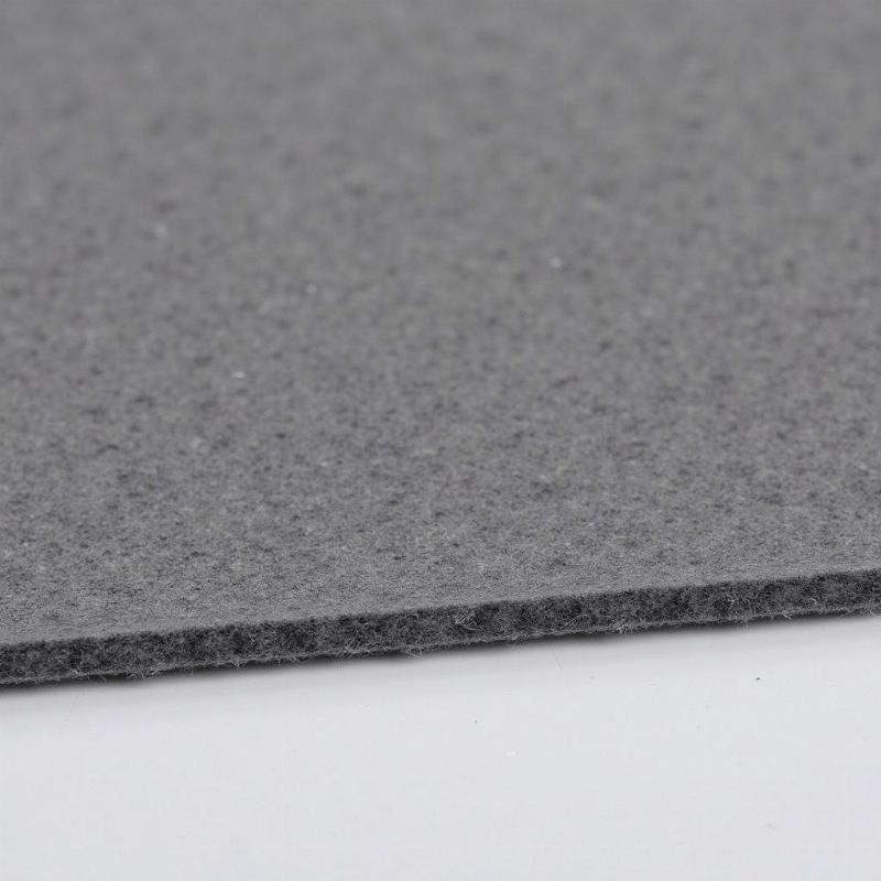 Hình ảnh cận cảnh cấu trúc độc đáo của vải dạ, không bị tưa sổ sợi khi cắt.